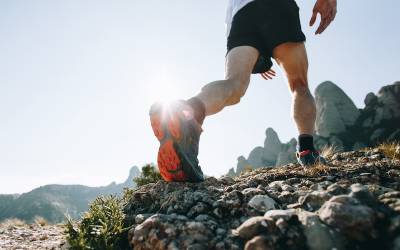 Cool man with tattoos ultra trail runner